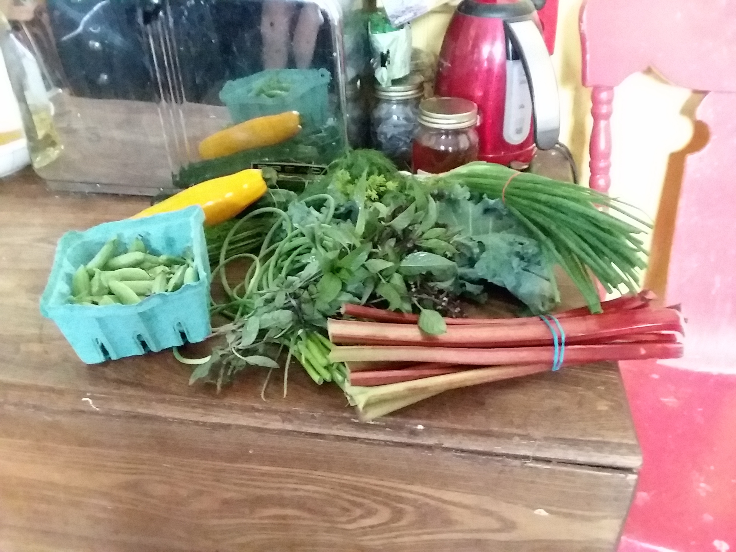 a bunch of veggies on a wooden table
